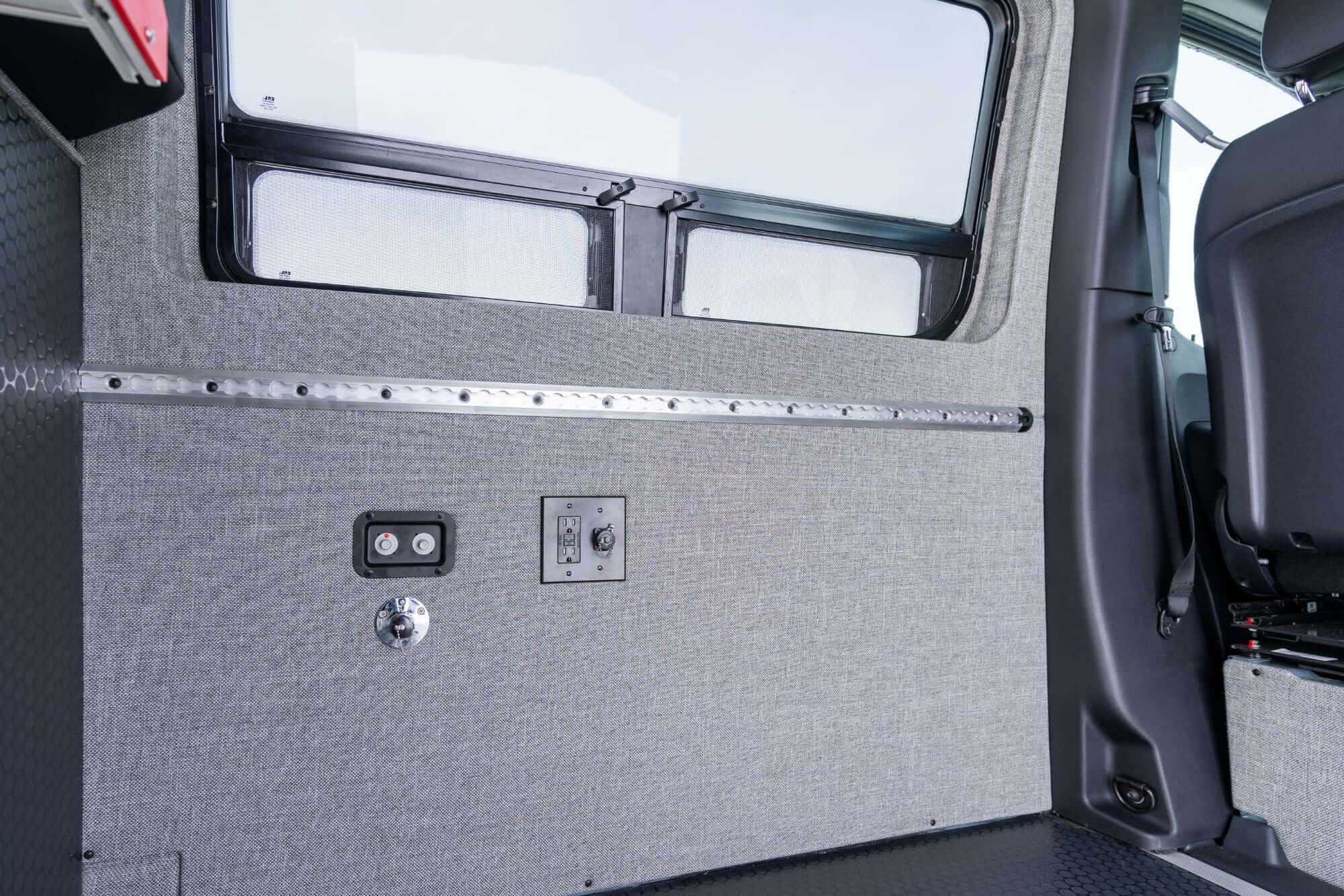 camper van sliding door open with with the kitchen galley with exterior fold-down table