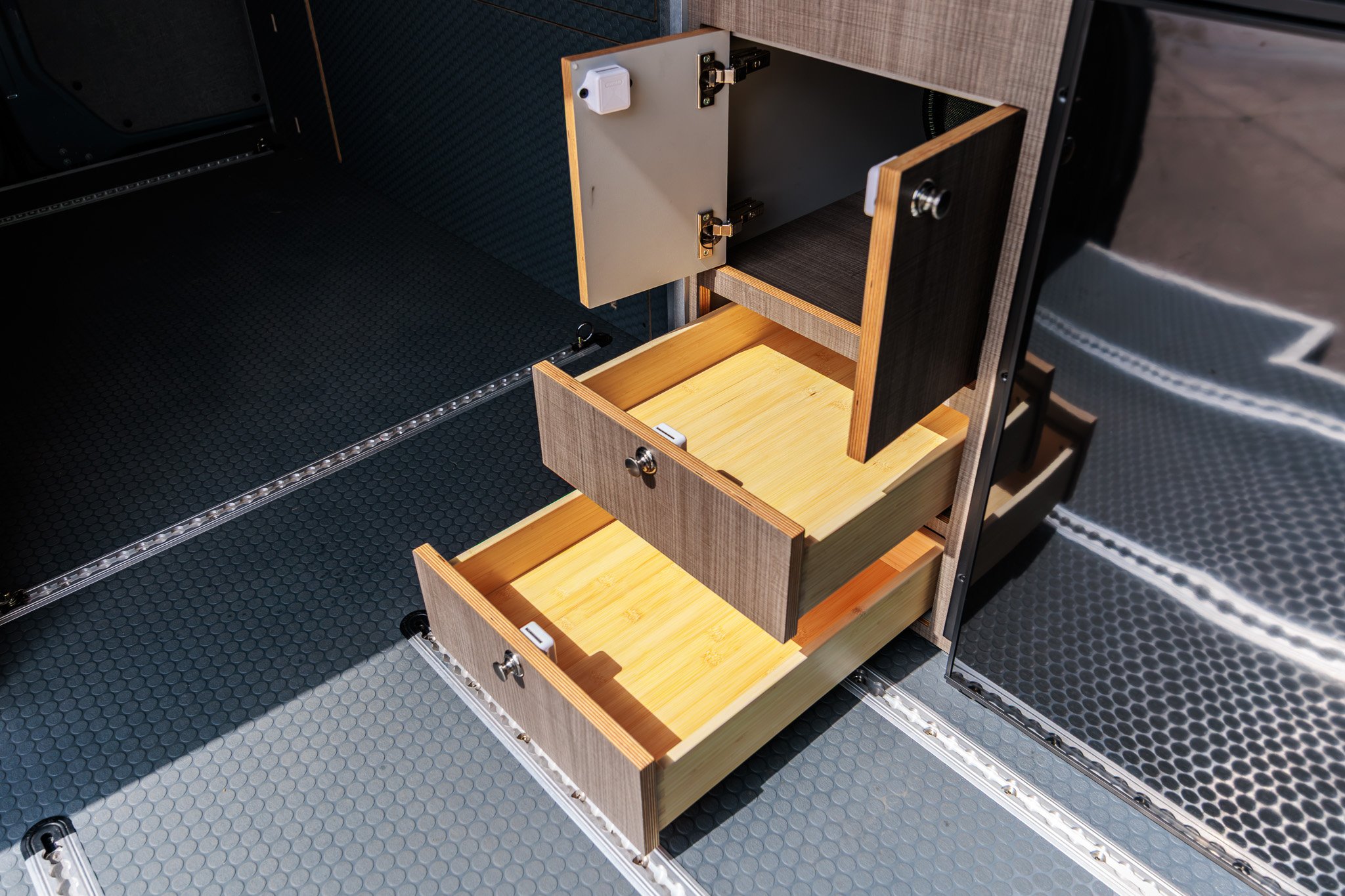 Elm laminate galley drawers pulled out, bamboo lined