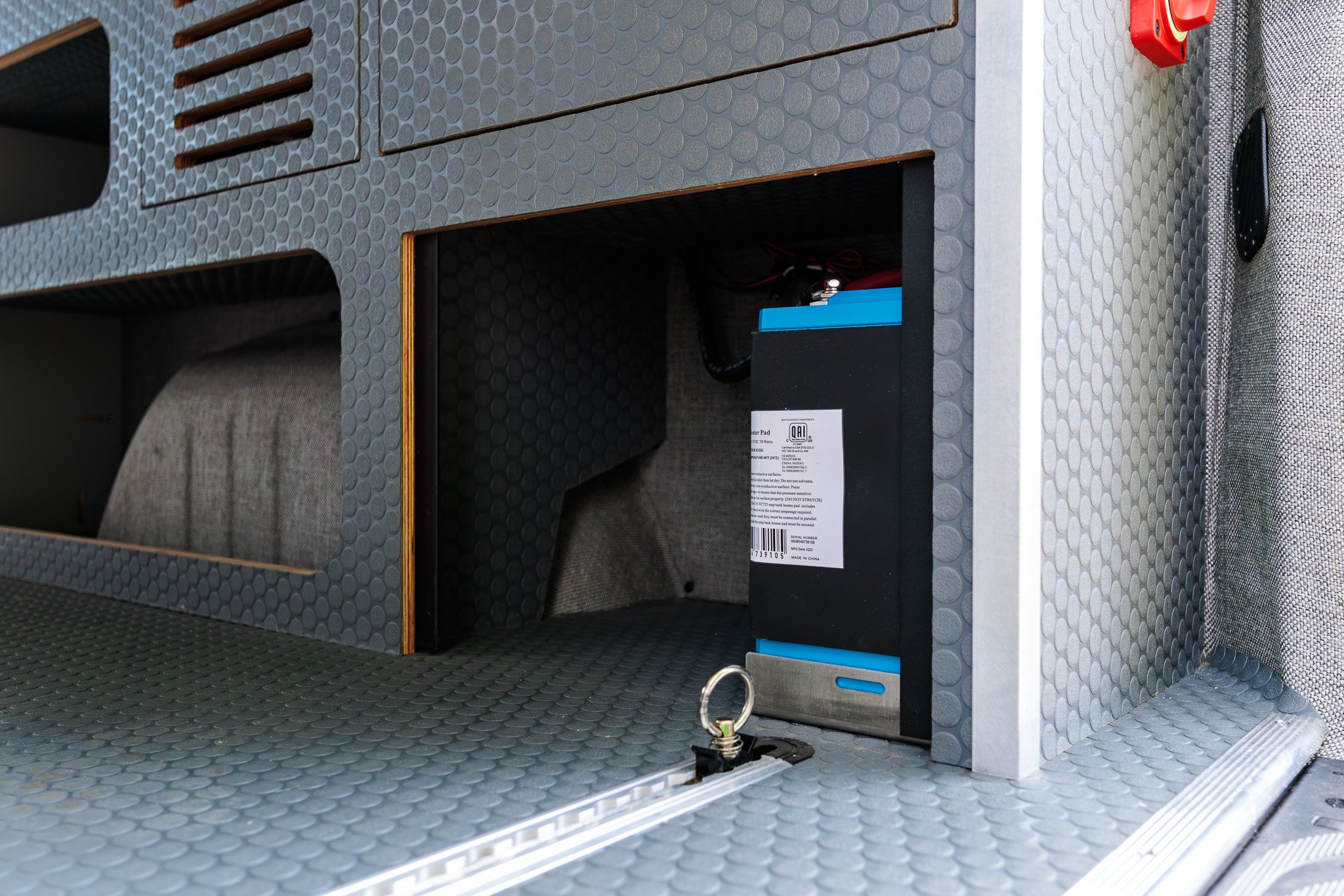 Under-bed compartment with the Victron 200 Ah lithium battery