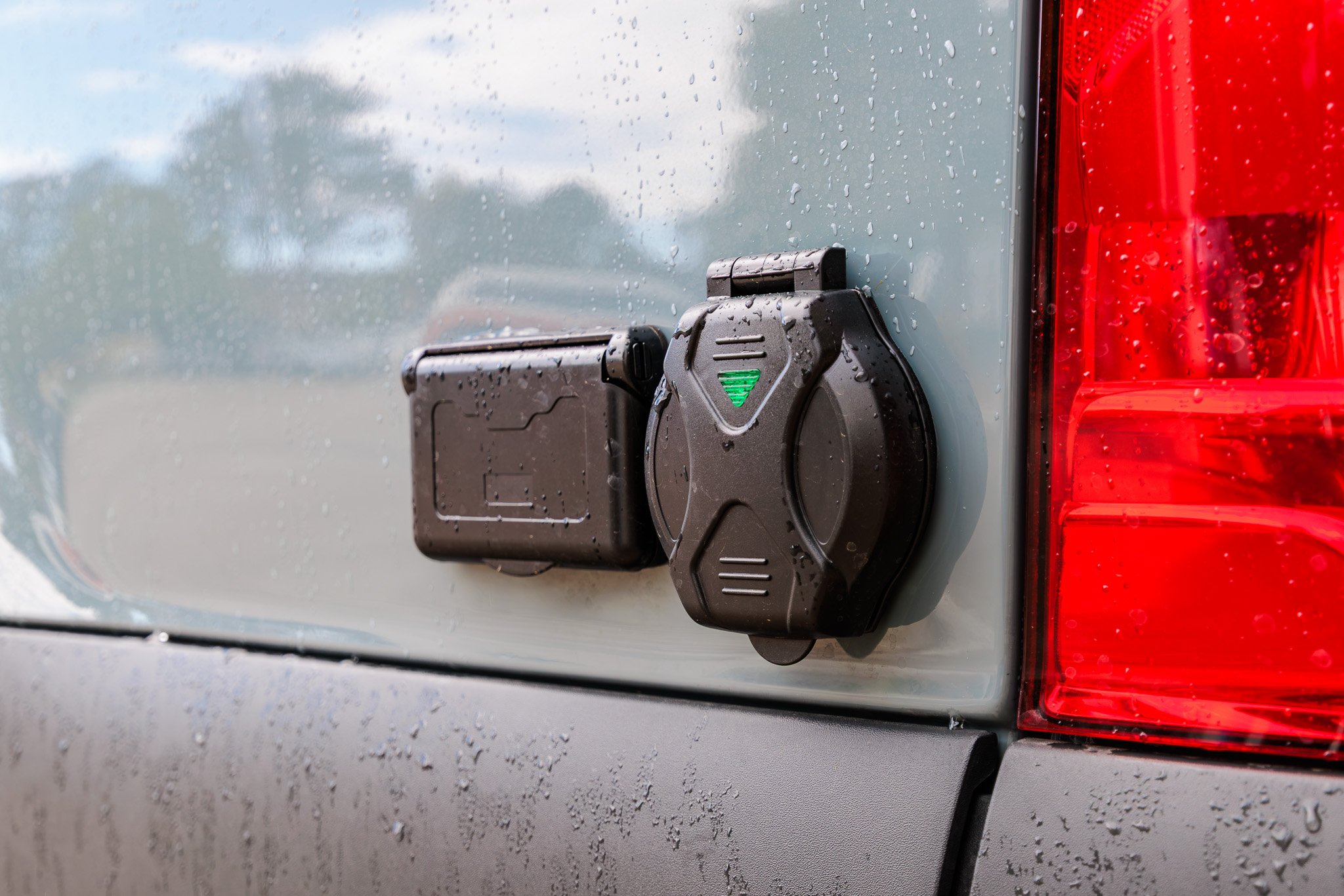 Exterior shore power inlet on the rear quarter panel