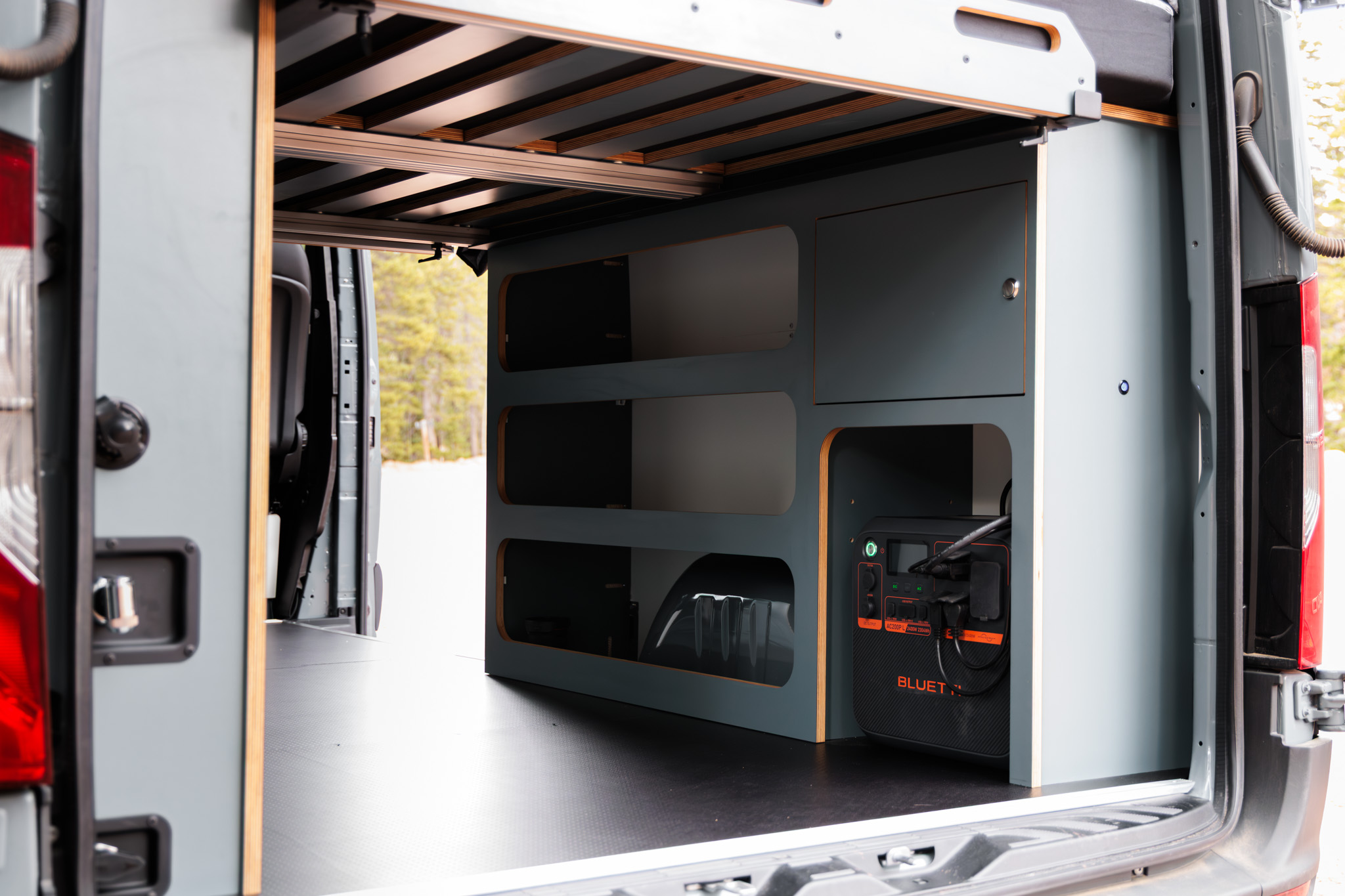 Storage under the bed, with the electrical cabinet