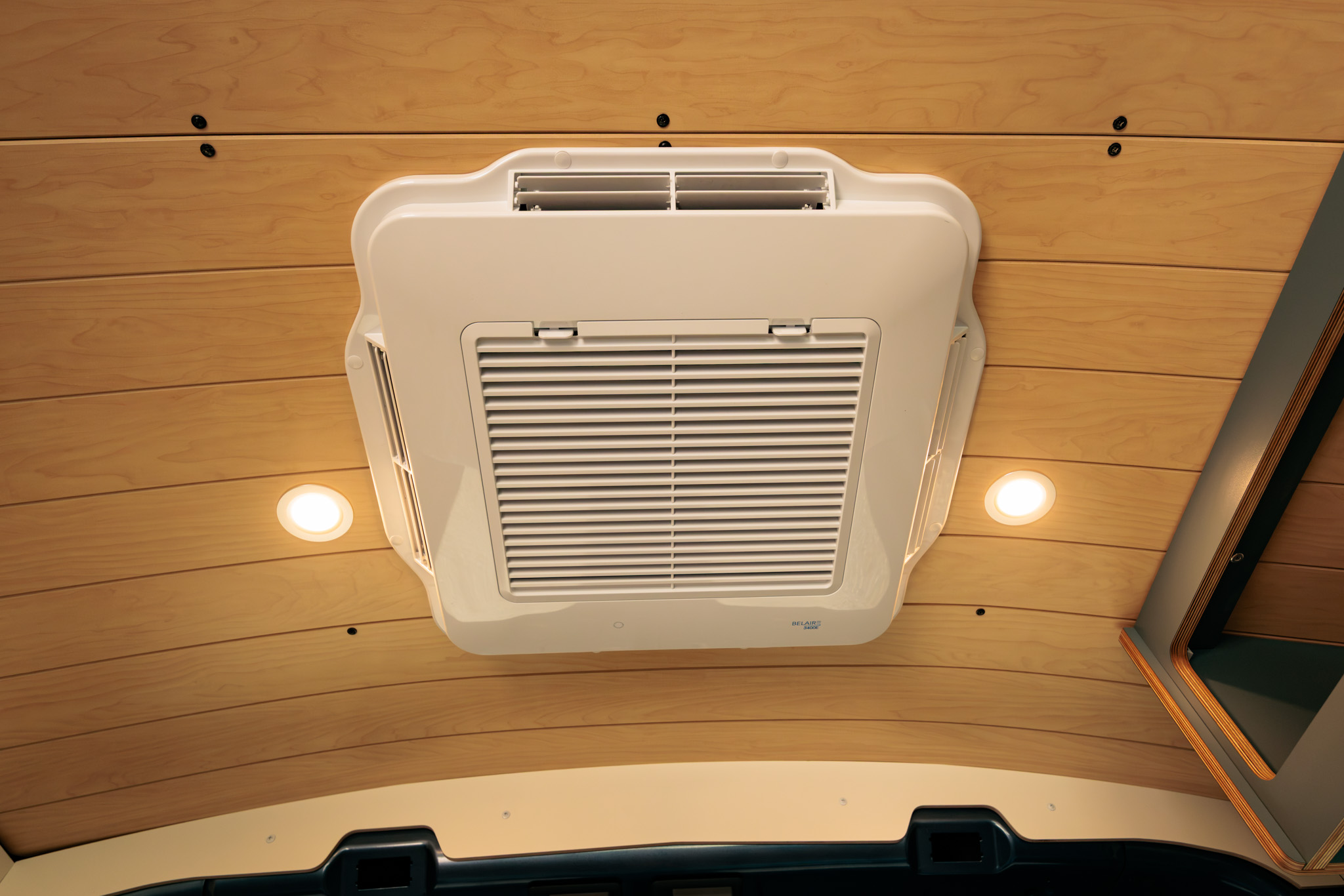 Rooftop air conditioner on the ceiling, with recessed LED lights