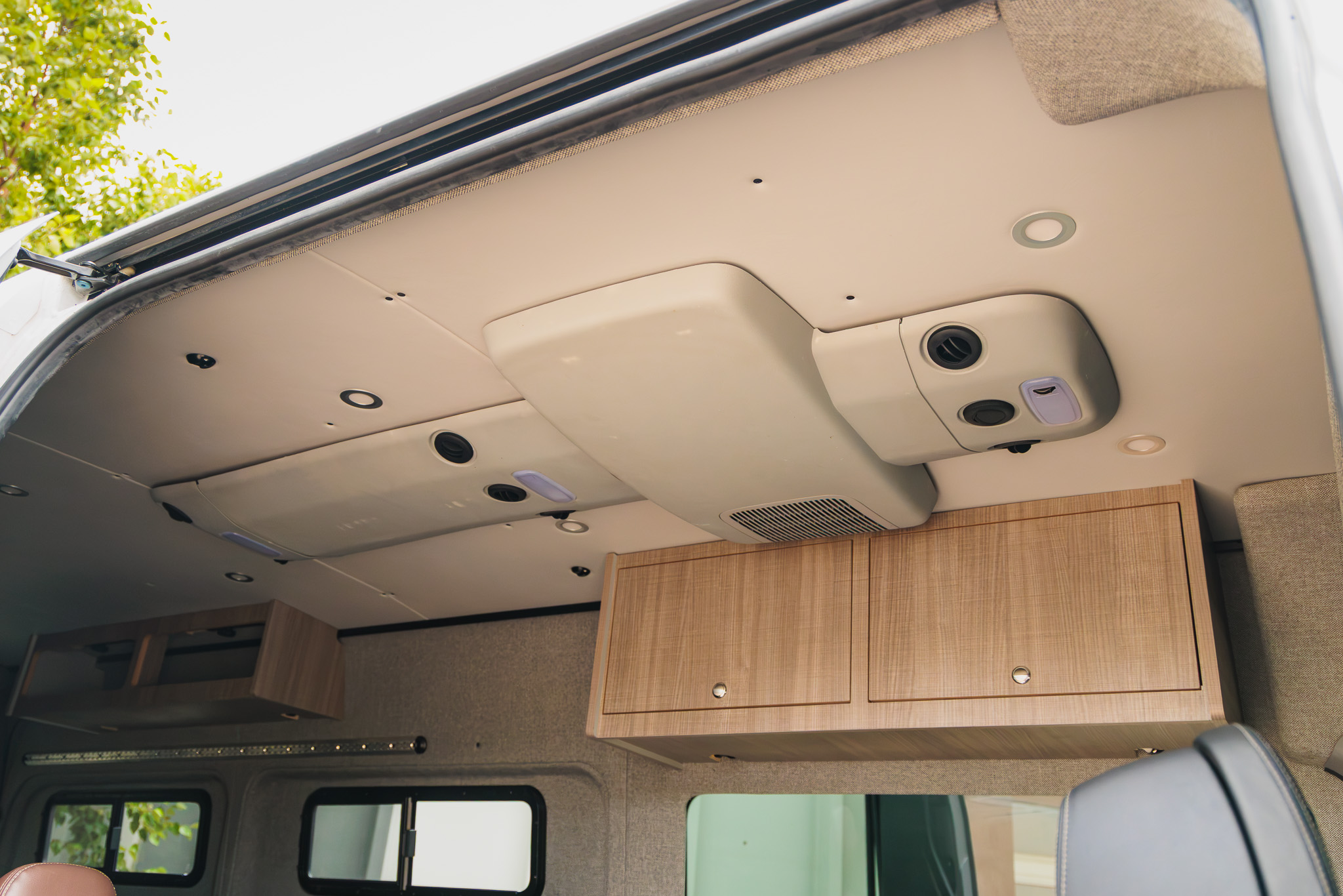 Headliner shelf and overhead cabinet