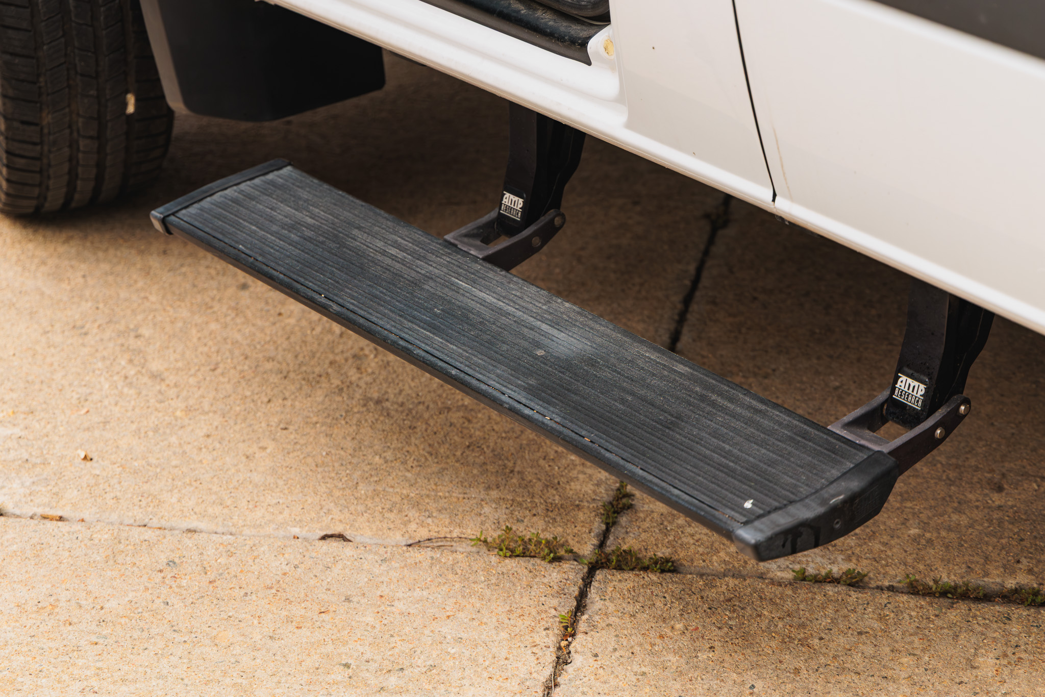 AMP Power folding side step deployed