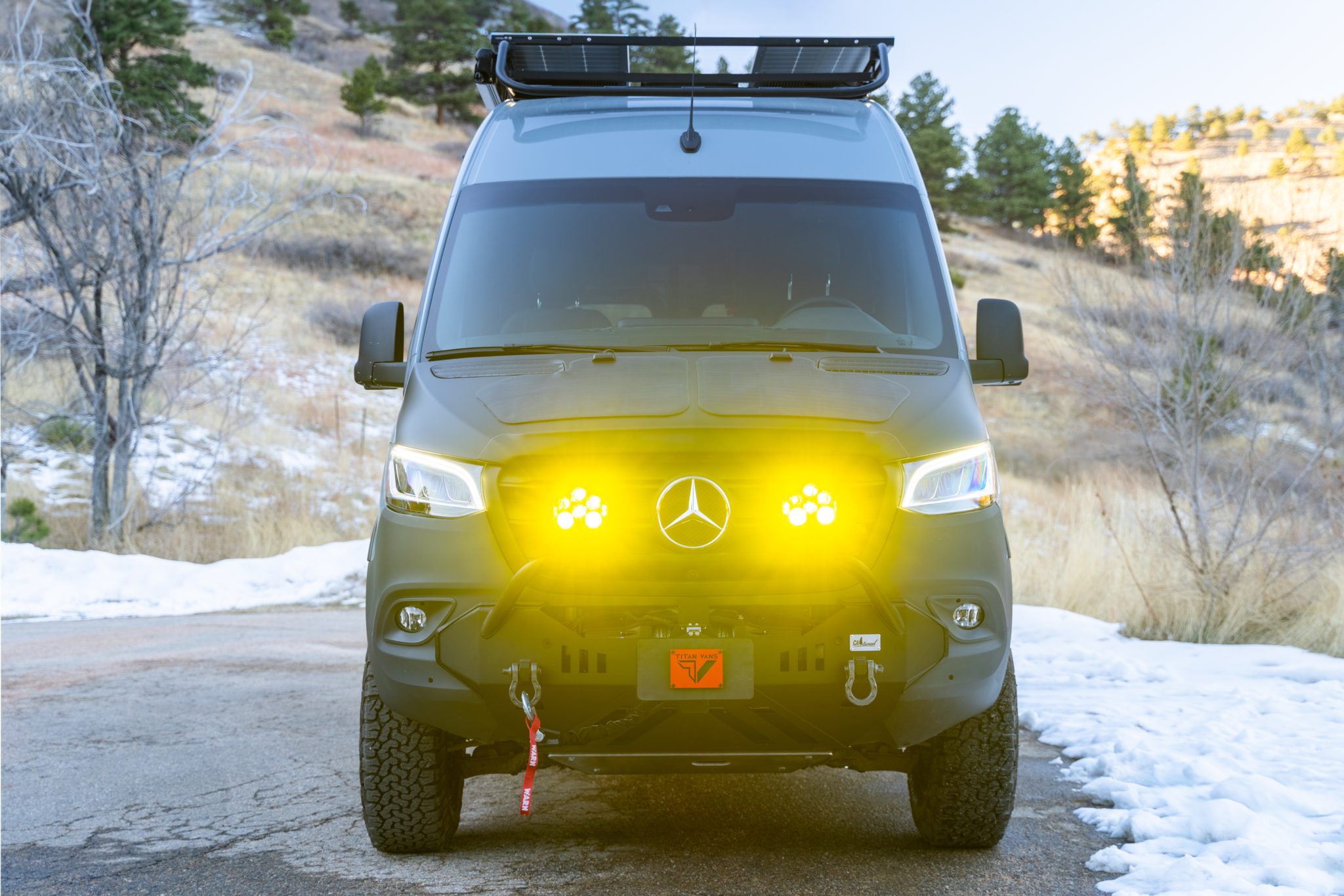Head-on view of the CA-tuned front bumper, winch and amber LP6 lights