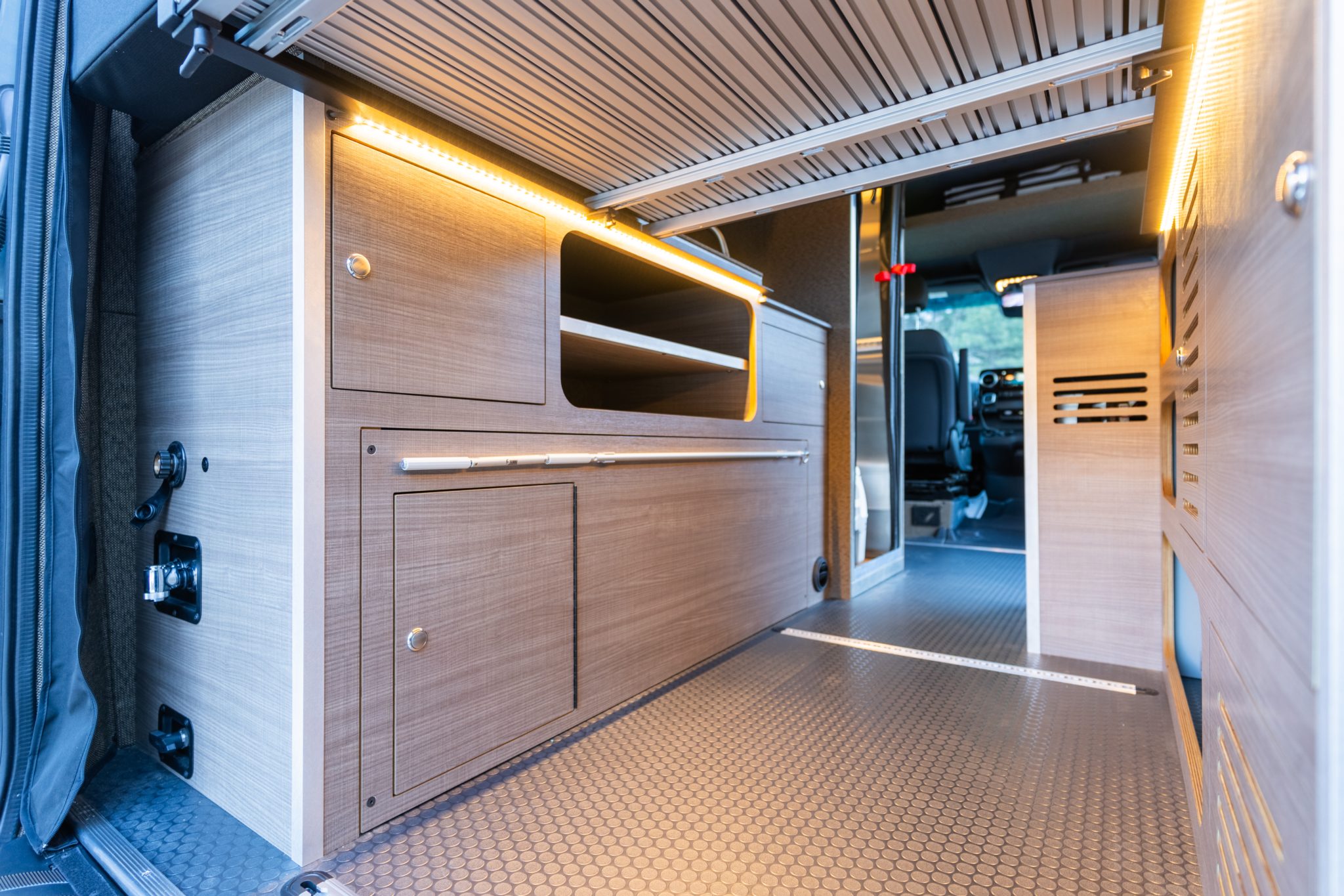 Driver side cabinetry in Elm laminate, looking forward to the cab